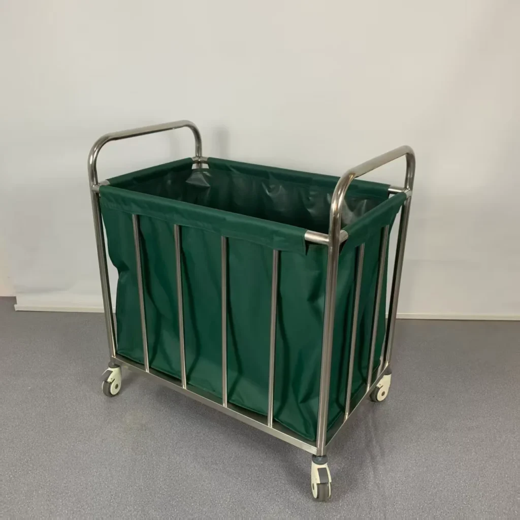 Green laundry cart with sturdy metal frame and wheels on a grey floor.