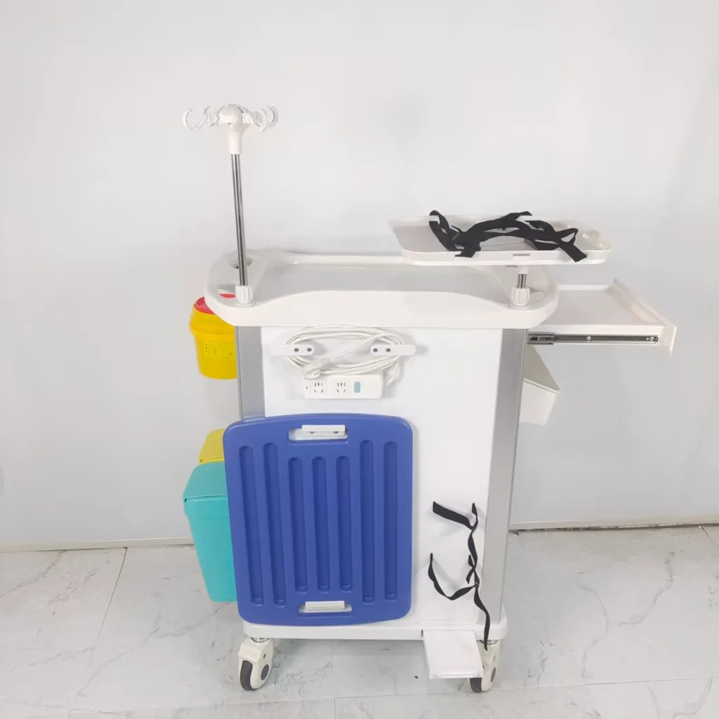 Hospital medical cart with blue and yellow compartments, utility hooks, and wheels, placed on a tiled floor.