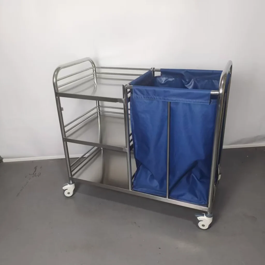 Stainless steel laundry cart with a blue fabric bag, featuring multiple shelves and four wheels.