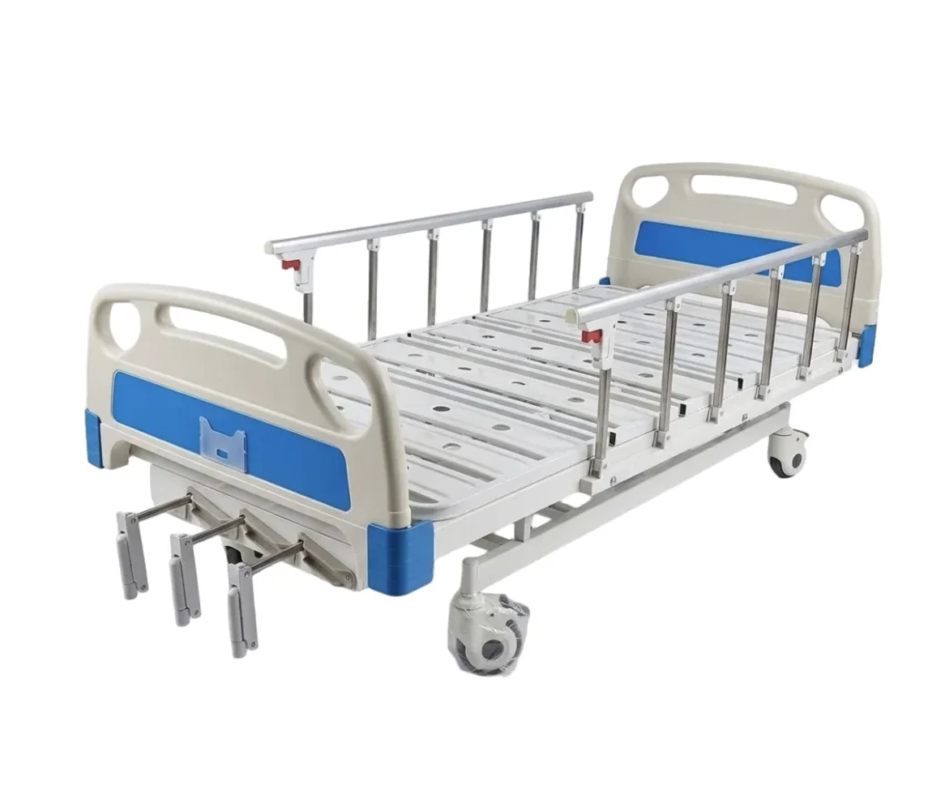 White adjustable hospital bed equipped with safety rails and caster wheels for mobility and ease of use.