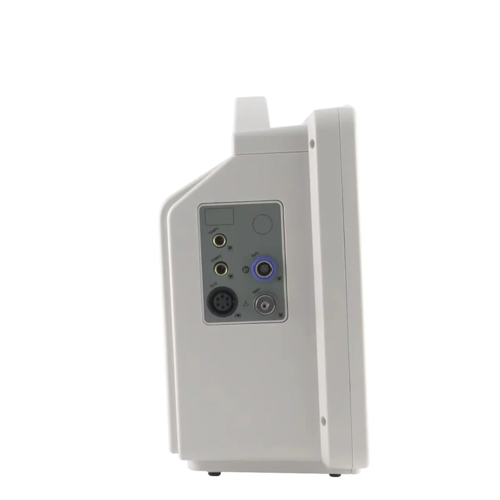 Side view of a medical monitor with various input ports including temperature and ECG connectors.