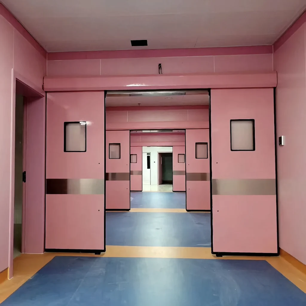 Pink hospital corridor featuring multiple sliding doors and blue flooring, creating a clean and orderly environment.