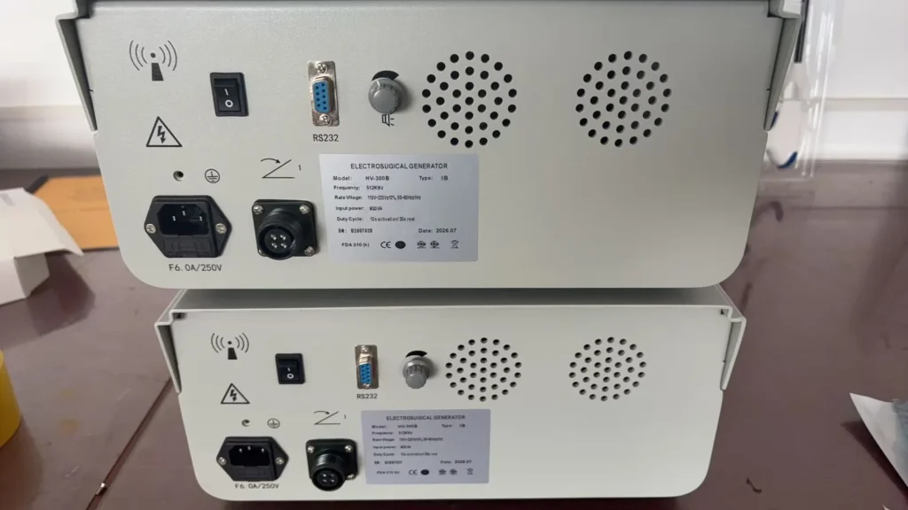 Close-up of the back panel of an electrosurgical generator model HV-300B showing connection ports, power supply input, and labels.