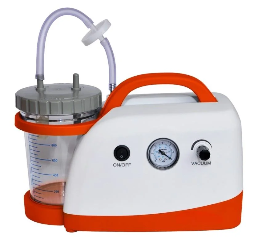Portable medical suction machine with an orange handle, vacuum gauge, on/off switch, transparent container with measurements, and tubing attachments.