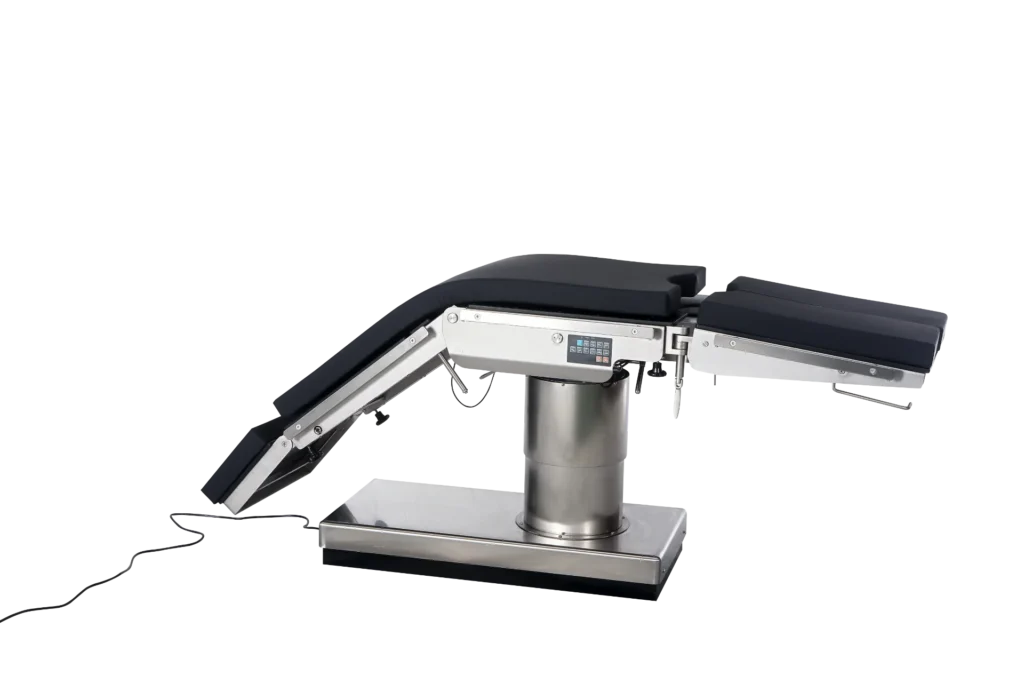 Electric surgical operating table with adjustable sections and control panel, in silver and black color.