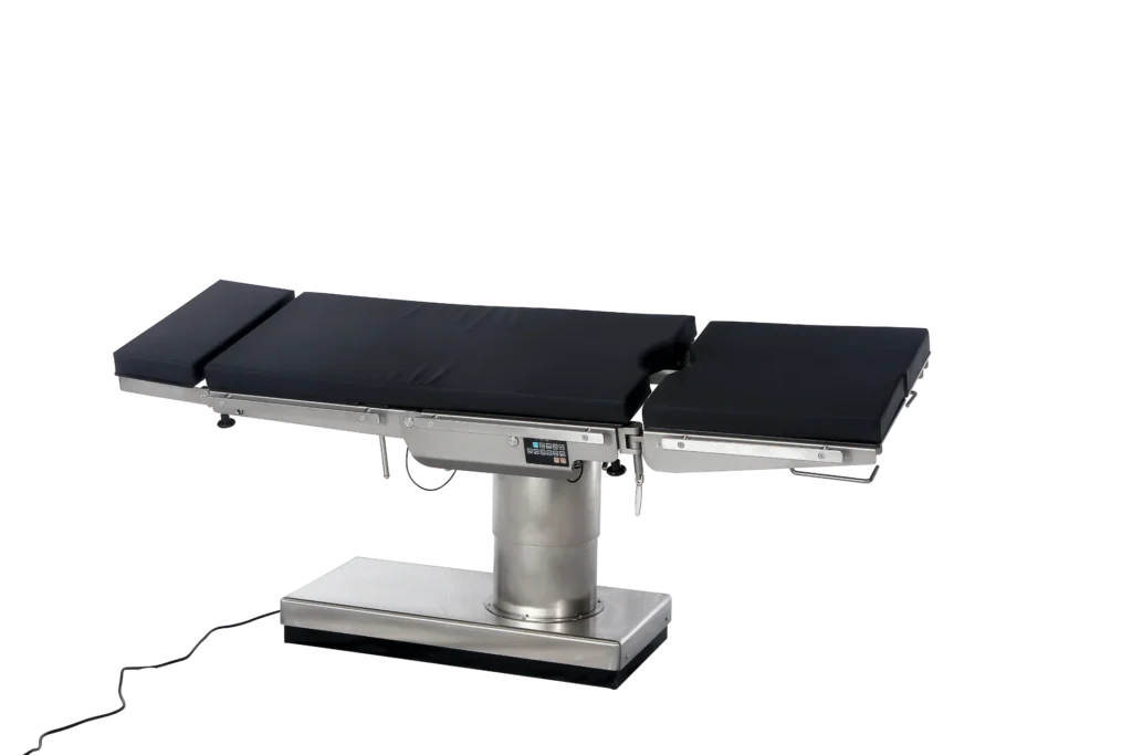 Stainless steel surgical operating table with adjustable black cushion and modern control panel, designed for medical procedures.